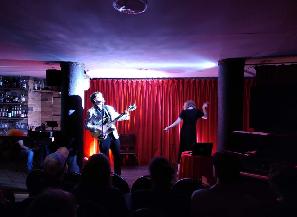 Lebo Sibul sings while Sasha Paris-Carter dances.