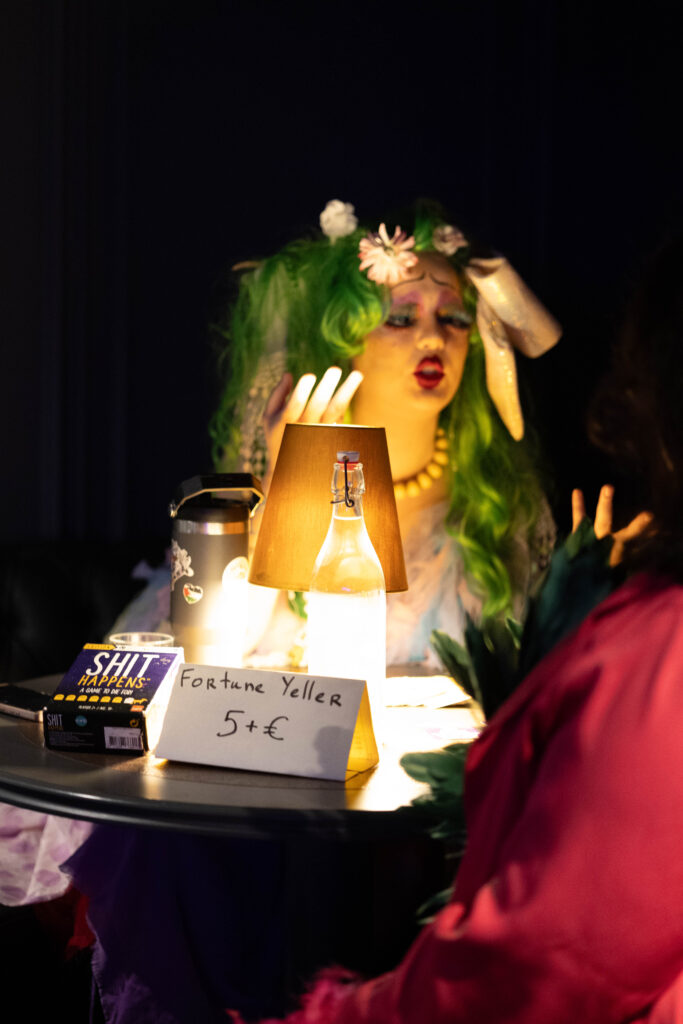 Cvm.Unity Surwigs providing "fortune yeller" readings at Tallinn Fringe Variety Extravaganza 2026 at Chicago 1933.